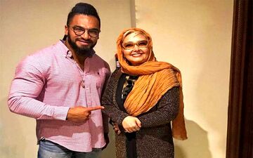صمیمانه خانم بازیگر و بدنساز معروف! + عکس