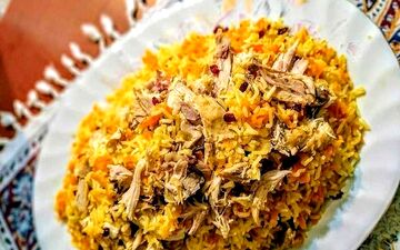 رشته پلو با مرغ ریش ریش شده را این طوری درست کن/ امتحان کن ضرر نمیکنی
