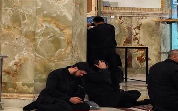 عکسی از محافظ آیت الله رئیسی در مراسم تشییع