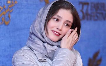 تیپ پسرانه و متفاوت فرشته حسینی | همسر نوید محمدزاده با این عکس غوغا به پا کرد!
