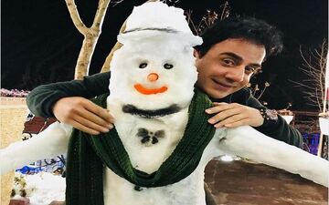 تیپ و ژست جالب عموپورنگ با آدم برفی (عکس)