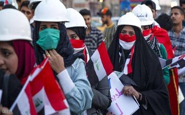 خوشحالی تظاهرکنندگان عراقی از تصویب قانون جدید انتخابات