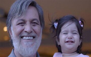 تصویری دیدنی از آقای بازیگر و نوه اش!