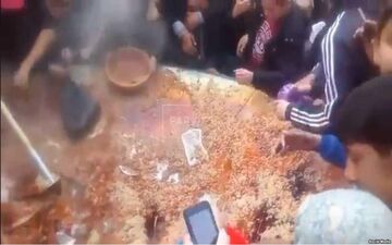 جنگ بر سر غذا در جشنواره پلو خوران تاجیکستان! +فیلم 