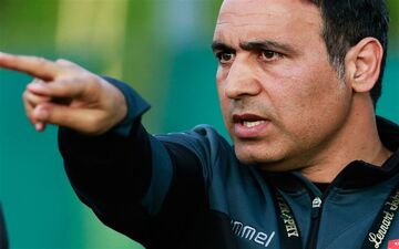 عکس یادگاری مهدوی‌کیا با کاپ جام جهانی