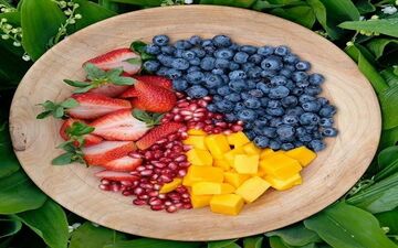 چه مواد غذایی همراه با ورزش به کاهش چربی‌های شکمی کمک می‌کند؟